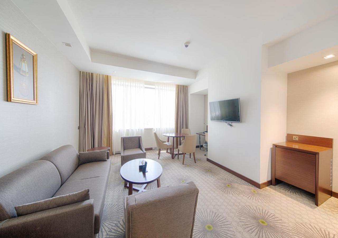 Holiday Suites Al Azizia メッカ エクステリア 写真 A room at the hotel