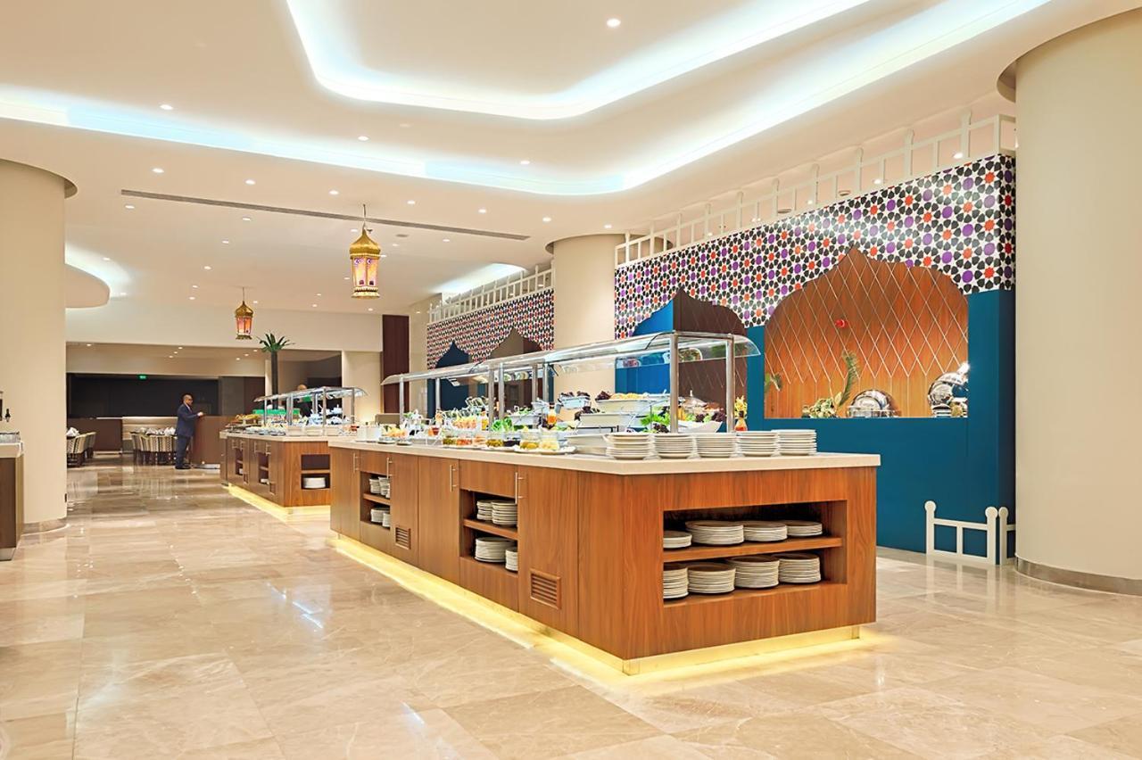 Holiday Suites Al Azizia メッカ エクステリア 写真 The hotel's restaurant