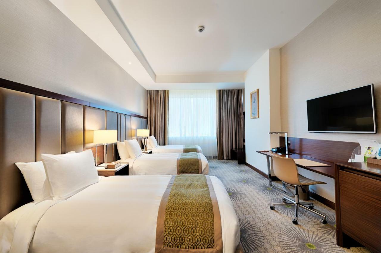 Holiday Suites Al Azizia メッカ エクステリア 写真 A room at the hotel